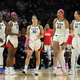 Chelsea Gray #12, Jackie Young #0, Kelsey Plum #10, A’ja Wilson #22 and Kiah Stokes #41 of the Las Vegas Aces walk back on the court after a timeout in their game against the Chicago Sky at Michelob ULTRA Arena on August 11, 2022 in Las Vegas, Nevada. (Photo by Ethan Miller/Getty Images)